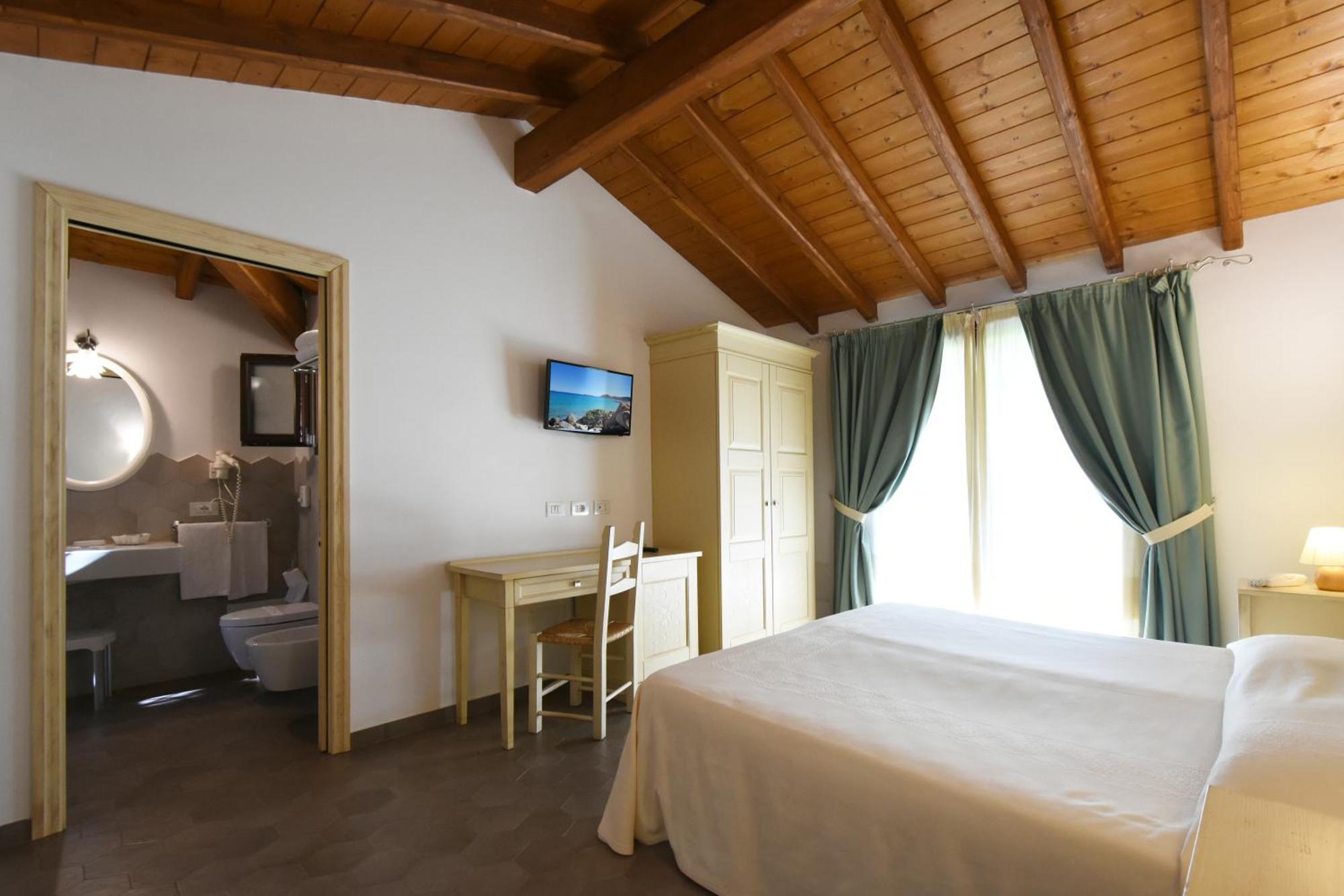 Le Anfore Hotel Villasimius Bagian luar foto