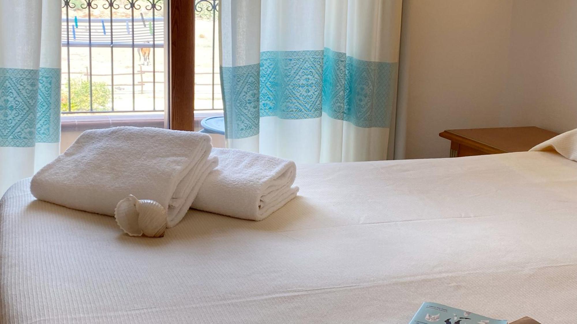 Le Anfore Hotel Villasimius Bagian luar foto